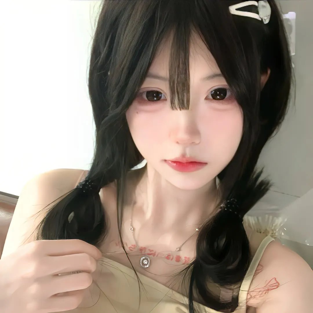 桃花含露又春风